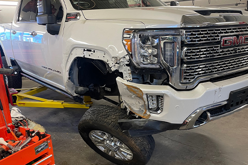 Harvs Auto Body Repair | Restoring a GMC Vehicle in the shop after an accident collision